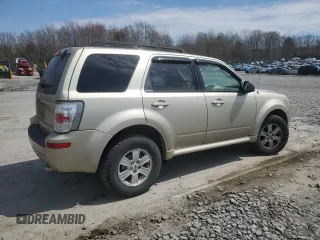 2010 Mercury Mariner z VIN 4M2CN9BG0AKJ17705, wystawiony jako Copart lot #53790315 z przebiegiem 154 832 mil mil oraz Szkody całkowita. Historia ofert i sprzedaży dostępna na DreamBid. Obrazek 3.