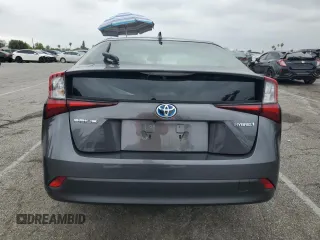 2019 Toyota Prius L Eco z VIN JTDKARFU0K3087436, wystawiony jako Copart lot #55699135 z przebiegiem Nie podano mil oraz Szkoda całkowita • Salvage title. Historia ofert i sprzedaży dostępna na DreamBid. Obrazek 6.