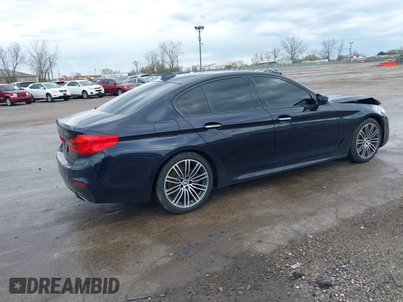 2018 BMW 5 Series 540i xDrive with VIN WBAJE7C58JWD49881, listed as a IAAI auction lot 42091065 with 73,542 mi miles and . Bid and sale history available at DreamBid. Image 4.