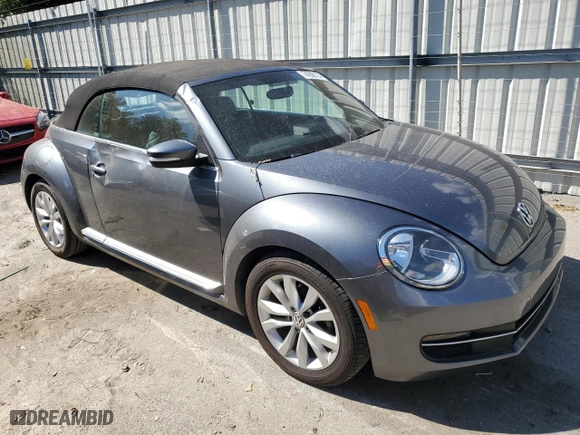 2013 Volkswagen Beetle Convertible 2.0L TDI w/Sound/Nav with VIN 3VW5L7AT2DM804279, listed as a Copart auction lot 74298124 with 55,693 mi miles and Salvage Title. Bid and sale history available at carsss.com. Image 4.