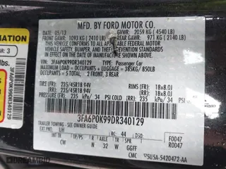 2013 Ford Fusion Titanium with VIN 3FA6P0K99DR340129, listed as a IAAI auction lot 41956835 with 105,730 mi miles. Bid and sale history available at carsss.com. Image 9.