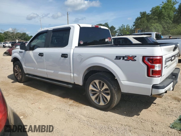 2018 Ford F-150 XL with VIN 1FTEW1CPXJKF27567, listed as a Copart auction lot 63034034 with 125,508 mi miles and Salvage title. Bid and sale history available at DreamBid. Image 2.