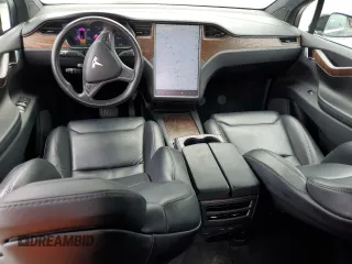 2018 Tesla Model X 75D with VIN 5YJXCBE24JF130216, listed as a Copart auction lot 48894215 with 75,694 mi miles and Salvage Title. Bid and sale history available at carsss.com. Image 8.