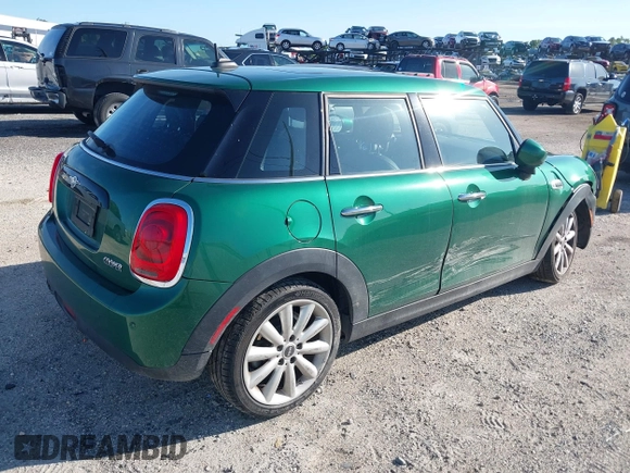 2020 MINI Hardtop 4 Door Cooper with VIN WMWXU7C06L2M63032, listed as a IAAI auction lot 42572567 with 86,220 mi miles and . Bid and sale history available at DreamBid. Image 4.
