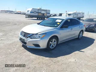 2016 Nissan Altima SR with VIN 1N4AL3AP3GC214309, listed as a IAAI auction lot 41863450 with 114,302 mi miles and . Bid and sale history available at carsss.com. Image 2.