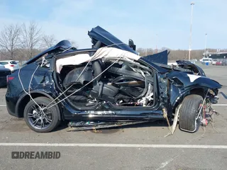 2024 Tesla Model Y Long Range with VIN 7SAYGDEE4RF149894, listed as a IAAI auction lot 41771185 with Not Provided miles and . Bid and sale history available at DreamBid. Image 12.
