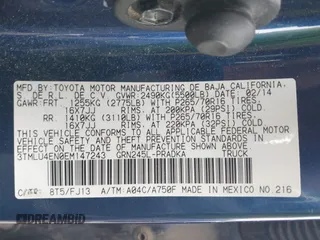 2014 Toyota Tacoma with VIN 3TMLU4EN0EM147243, listed as a IAAI auction lot 41684902 with 308,167 mi miles. Bid and sale history available at carsss.com. Image 9.