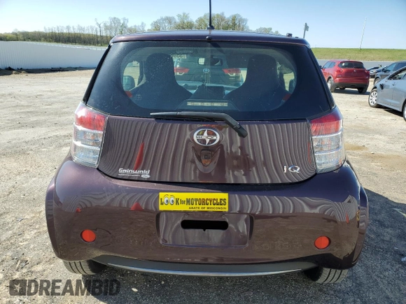 2012 Scion iQ z VIN JTNJJXB02CJ015858, wystawiony jako Copart lot #55963055 z przebiegiem 37 122 mil mil oraz Nie do naprawy • Non repairable. Historia ofert i sprzedaży dostępna na DreamBid. Obrazek 6.