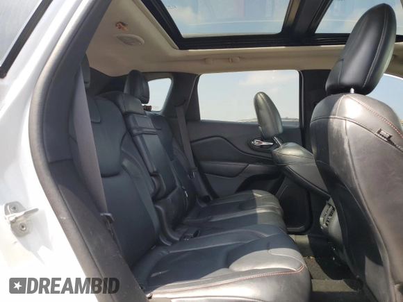 2014 Jeep Cherokee Trailhawk with VIN 1C4PJMBS9EW140344, listed as a Copart auction lot 50579005 with 117,326 mi miles and Salvage Title. Bid and sale history available at carsss.com. Image 11.
