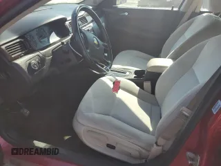 2014 Chevrolet Impala LT with VIN 2G1WB5E30E1147475, listed as a Copart auction lot 53700655 with 134,661 mi miles and Salvage title. Bid and sale history available at DreamBid. Image 7.