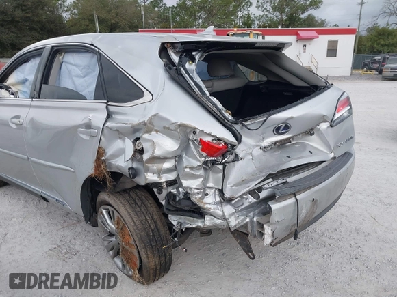 2013 Lexus RX 450h with VIN JTJZB1BA8D2008237, listed as a IAAI auction lot 41574651 with 106,732 mi miles and . Bid and sale history available at DreamBid. Image 6.