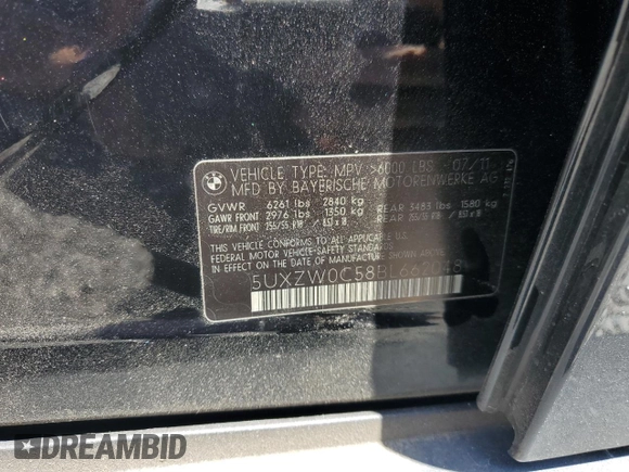 2011 BMW X5 35d with VIN 5UXZW0C58BL662048, listed as a Copart auction lot 52158795 with 166,291 mi miles and Salvage title. Bid and sale history available at DreamBid. Image 13.