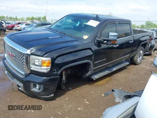 2016 GMC Sierra 2500HD Denali z VIN 1GT12UE84GF259750, wystawiony jako IAAI lot #42221632 z przebiegiem 201 055 mil mil oraz . Historia ofert i sprzedaży dostępna na DreamBid. Obrazek 2.