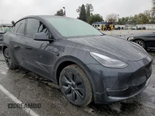2025 Tesla Model Y Long Range with VIN 7SAYGAEE3SF216635, listed as a Copart auction lot 44614555 with 400 mi miles and Salvage Title. Bid and sale history available at DreamBid. Image 4.