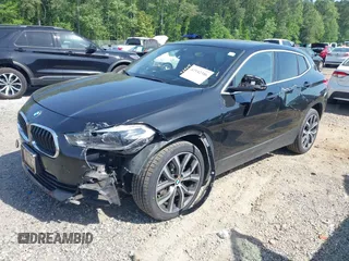 2020 BMW X2 xDrive28i z VIN WBXYJ1C03L5P60659, wystawiony jako IAAI lot #42142386 z przebiegiem 106 914 mil mil oraz . Historia ofert i sprzedaży dostępna na DreamBid. Obrazek 2.