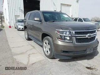 2016 Chevrolet Tahoe LT z VIN 1GNSCBKCXGR163237, wystawiony jako IAAI lot #41818905 z przebiegiem 182 623 mil mil oraz . Historia ofert i sprzedaży dostępna na DreamBid. Obrazek 1.