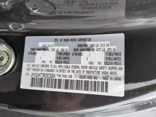 2024 Mazda MX-5 Miata Grand Touring z VIN JM1NDAM73R0603254, wystawiony jako Copart lot #74551704 z przebiegiem Nie podano mil oraz Nie do naprawy • Non repairable. Historia ofert i sprzedaży dostępna na DreamBid. Obrazek 13.