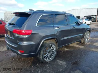 2014 Jeep Grand Cherokee Overland with VIN 1C4RJFCT8EC183165, listed as a IAAI auction lot 41298114 with 114,187 mi miles. Bid and sale history available at carsss.com. Image 4.