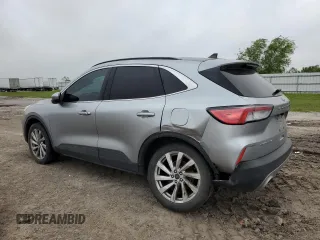 2021 Ford Escape Titanium с VIN 1FMCU9J99MUB12020, выставлен на аукционе Copart как лот 51443365 с пробегом 63 504 миль миль и Списание • Salvage title. История ставок и продаж доступна на DreamBid. Изображение 2.