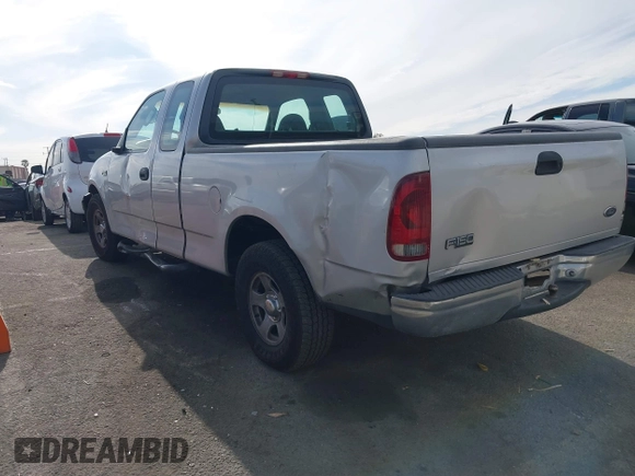 2002 Ford F-150 XL with VIN 1FTRX17262NB99755, listed as a IAAI auction lot 41181246 with 1 mi miles. Bid and sale history available at carsss.com. Image 3.