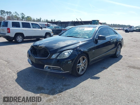 2012 Mercedes-Benz E 350 with VIN WDDKJ5KB1CF161028, listed as a IAAI auction lot 41672278 with 238,710 mi miles and . Bid and sale history available at DreamBid. Image 2.