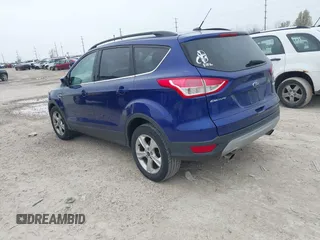 2016 Ford Escape SE with VIN 1FMCU0GX9GUB93543, listed as a IAAI auction lot 42017226 with 208,092 mi miles. Bid and sale history available at carsss.com. Image 3.