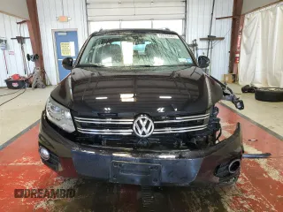 2017 Volkswagen Tiguan Sport z VIN WVGUV7AXXHK007234, wystawiony jako Copart lot #60206065 z przebiegiem 133 316 mil mil oraz Szkoda całkowita • Salvage title. Historia ofert i sprzedaży dostępna na DreamBid. Obrazek 5.