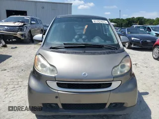 2009 Smart fortwo Pure z VIN WMEEJ31X79K268191, wystawiony jako Copart lot #61767475 z przebiegiem 221 317 mil mil oraz Czysty tytuł • Clean title. Historia ofert i sprzedaży dostępna na DreamBid. Obrazek 5.