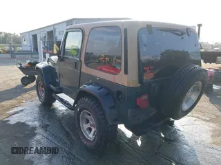 2001 Jeep Wrangler Sport with VIN 1J4FA49S71P315061, listed as a IAAI auction lot 41525441 with 178,809 mi miles. Bid and sale history available at carsss.com. Image 3.