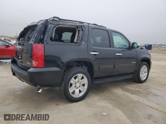2012 GMC Yukon SLT with VIN 1GKS1CE04CR158460, listed as a Copart auction lot 84459174 with 153,662 mi miles and Salvage Title. Bid and sale history available at carsss.com. Image 3.