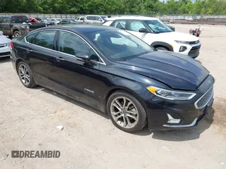 2019 Ford Fusion Titanium with VIN 3FA6P0RU0KR260239, listed as a IAAI auction lot 42436643 with 114,631 mi miles and . Bid and sale history available at DreamBid. Image 1.