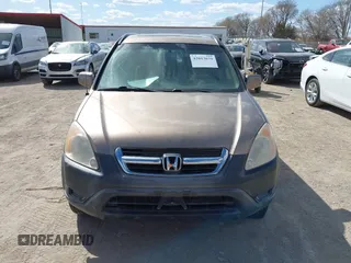 2004 Honda CR-V EX with VIN JHLRD78874C005539, listed as a IAAI auction lot 42013679 with 146,734 mi miles and . Bid and sale history available at carsss.com. Image 6.