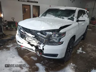 2015 Chevrolet Tahoe Commercial with VIN 1GNSK2EC8FR722684, listed as a IAAI auction lot 41553558 with 119,434 mi miles and . Bid and sale history available at DreamBid. Image 17.