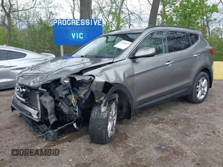 2013 Hyundai Santa Fe Sport z VIN 5XYZUDLA3DG114436, wystawiony jako IAAI lot #42084871 z przebiegiem 96 000 mil mil oraz . Historia ofert i sprzedaży dostępna na DreamBid. Obrazek 6.