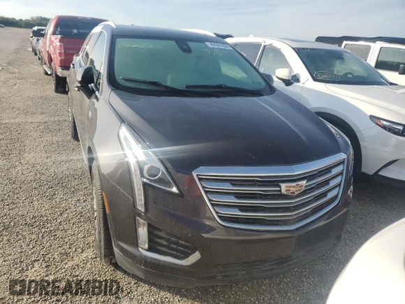 2017 Cadillac XT5 Luxury AWD z VIN 1GYKNDRSXHZ267282, wystawiony jako Copart lot #82061694 z przebiegiem Nie podano mil oraz Szkoda całkowita • Salvage title. Historia ofert i sprzedaży dostępna na DreamBid. Obrazek 5.