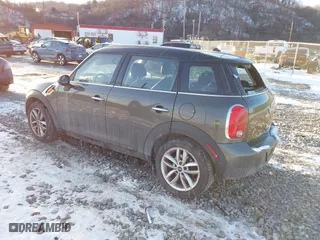 2013 MINI Cooper Countryman with VIN WMWZB3C58DWM31146, listed as a IAAI auction lot 41423661 with 97,505 mi miles. Bid and sale history available at carsss.com. Image 3.