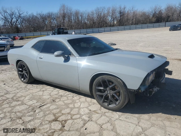 2021 Dodge Challenger GT with VIN 2C3CDZJG4MH674188, listed as a Copart auction lot 48475945 with 69,912 mi miles and Salvage Title. Bid and sale history available at carsss.com. Image 4.