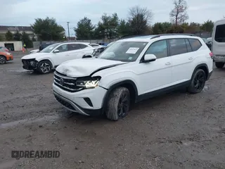 2022 Volkswagen Atlas SE z VIN 1V2KR2CA1NC555087, wystawiony jako IAAI lot #40921013 z przebiegiem 62 834 mil mil oraz . Historia ofert i sprzedaży dostępna na DreamBid. Obrazek 21.