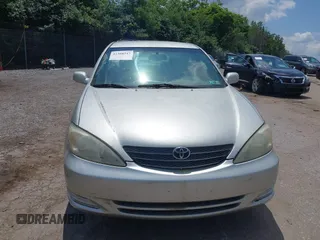 2004 Toyota Camry LE z VIN 4T1BE32K64U881677, wystawiony jako IAAI lot #42388247 z przebiegiem 173 550 mil mil oraz . Historia ofert i sprzedaży dostępna na DreamBid. Obrazek 6.
