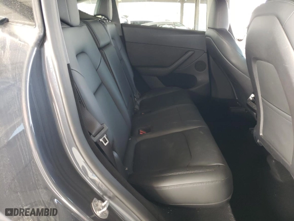 2023 Tesla Model Y Long Range with VIN 7SAYGDEEXPA137582, listed as a Copart auction lot 46869265 with 16,474 mi miles and Salvage Title. Bid and sale history available at carsss.com. Image 11.