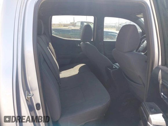 2018 Toyota Tacoma SR with VIN 3TMCZ5AN3JM170037, listed as a IAAI auction lot 42565385 with 157,450 mi miles and . Bid and sale history available at DreamBid. Image 8.