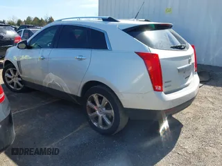 2014 Cadillac SRX Performance Collection with VIN 3GYFNCE36ES527809, listed as a IAAI auction lot 41790776 with 166,302 mi miles. Bid and sale history available at carsss.com. Image 3.