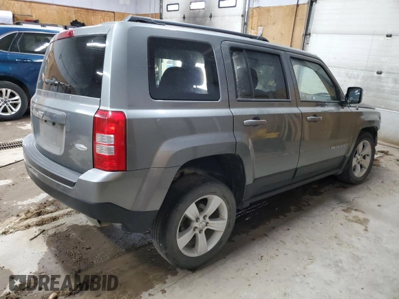 2014 Jeep Patriot Latitude with VIN 1C4NJRFBXED546921, listed as a Copart auction lot 61032895 with 133,344 mi miles and Clean title. Bid and sale history available at DreamBid. Image 3.