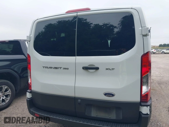 2023 Ford Transit Passenger XL with VIN 1FBAX2Y81PKA49071, listed as a IAAI auction lot 42309750 with 73,946 mi miles and . Bid and sale history available at DreamBid. Image 16.