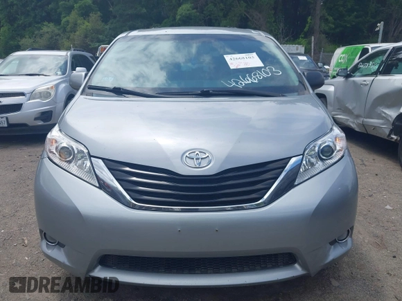 2013 Toyota Sienna LE with VIN 5TDJK3DC9DS054310, listed as a IAAI auction lot 42668103 with 209,712 mi miles and . Bid and sale history available at DreamBid. Image 12.