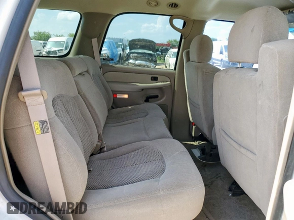 2002 Chevrolet Tahoe LS with VIN 1GNEC13Z32R200857, listed as a Copart auction lot 59812865 with 116,823 mi miles and Salvage title. Bid and sale history available at DreamBid. Image 11.