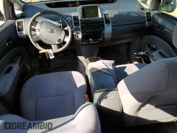 2007 Toyota Prius z VIN JTDKB20U573288978, wystawiony jako Copart lot #57469155 z przebiegiem 170 422 mil mil oraz Szkoda całkowita • Salvage title. Historia ofert i sprzedaży dostępna na DreamBid. Obrazek 8.