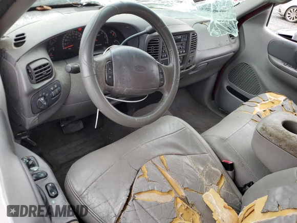 1999 Ford F-150 with VIN 1FTRX17W3XNA26575, listed as a Copart auction lot 81508484 with 138,704 mi miles and Salvage title. Bid and sale history available at DreamBid. Image 8.