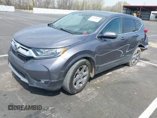 2017 Honda CR-V EX-L with VIN 7FARW1H89HE002384, listed as a IAAI auction lot 41908640 with 131,229 mi miles. Bid and sale history available at carsss.com. Image 2.