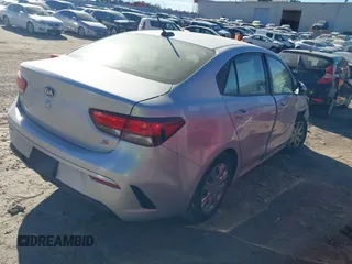 2021 Kia Rio S with VIN 3KPA24AD4ME363969, listed as a IAAI auction lot 41304242 with 119,194 mi miles and . Bid and sale history available at DreamBid. Image 4.